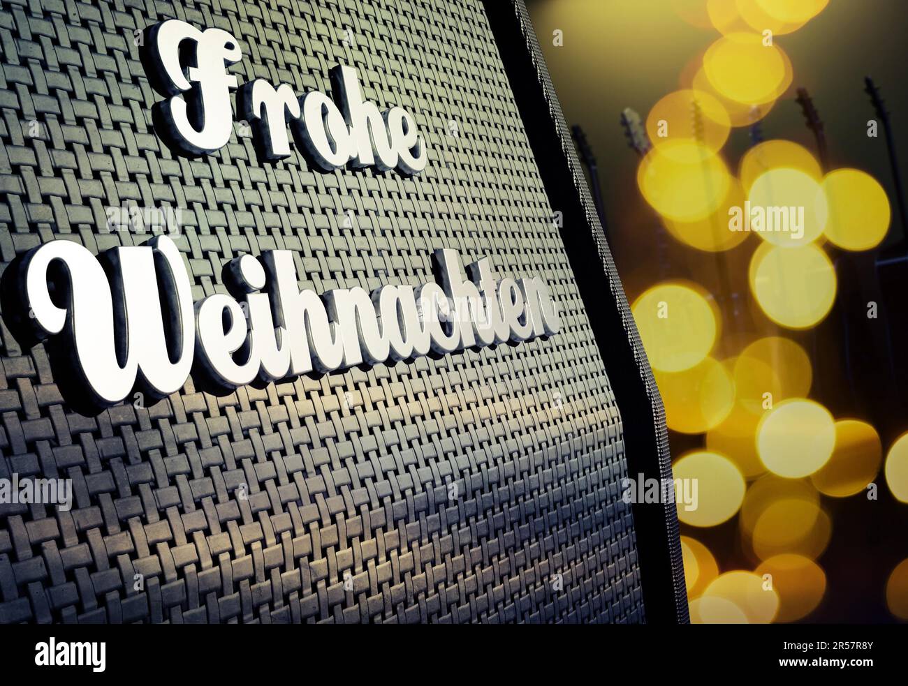 Close up of a guitar amp with German Merry Christmas badge and blurred ...