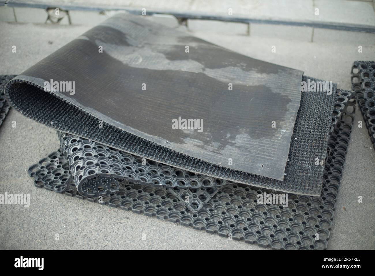 Rubber mat. Carpet in dust. Rubber coating. Cleaning mat. Cleaning from