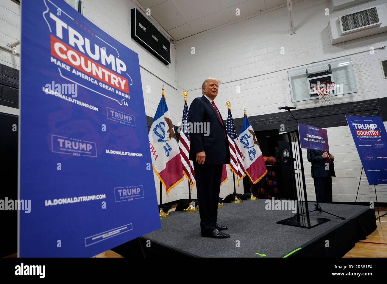 Former President Donald Trump visits with campaign volunteers at the