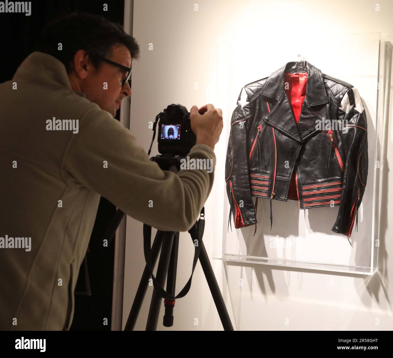 June 1, 2023, New York City, New York, USA: A photographer photographs Freddie Mercury's Leather Arrows Stage Jacket seen at the ''˜Freddie Mercury A World Of His Own' Preview Exhibition held at Sotheby's New York Galleries. The stage jacket was worn for Queen's first and only appearance on ''˜Saturday Night Live' on September 25, 1982. The jacket is estimated at $24,900 -37,400. (Credit Image: © Nancy Kaszerman/ZUMA Press Wire) EDITORIAL USAGE ONLY! Not for Commercial USAGE! Stock Photo