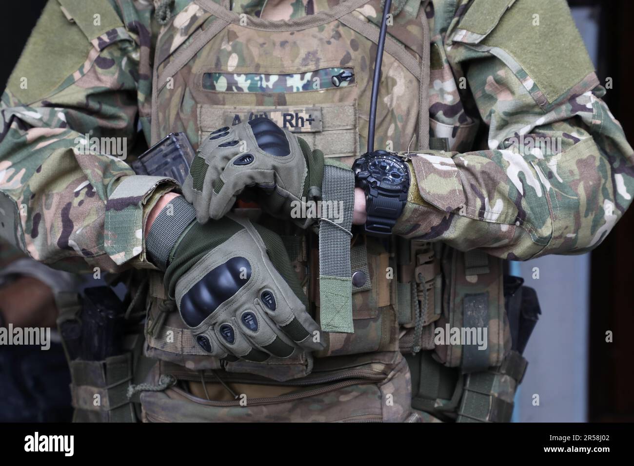 UKRAINE - JUNE 01, 2023 - A soldier of the Dyke Pole separate Special Forces battalion wears his ammunition, Ukraine. Stock Photo