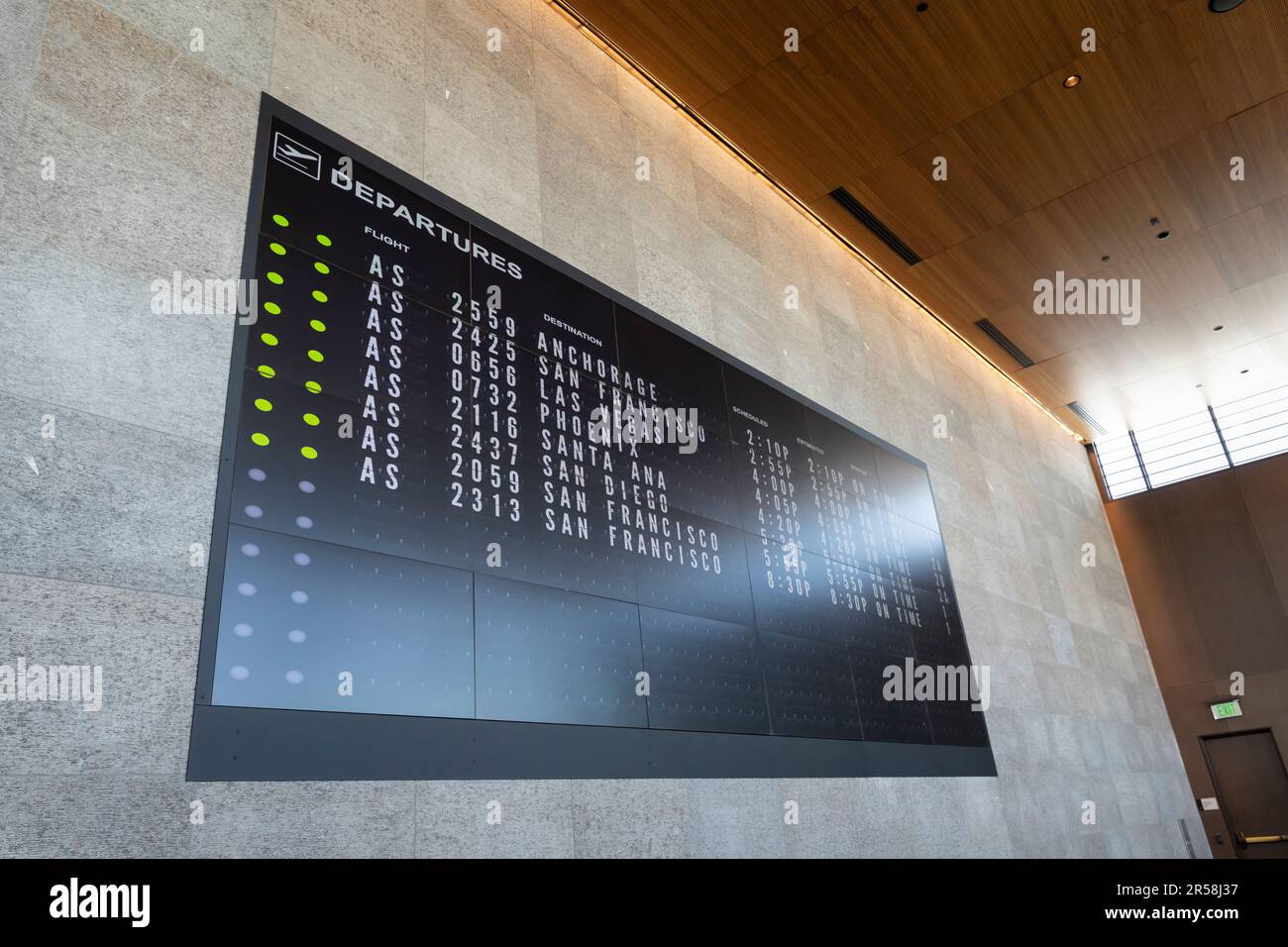 Everett, Washington, USA. 1st June, 2023. The flight board displays upcoming departures at Paine Field Passenger Terminal. Stock Photo