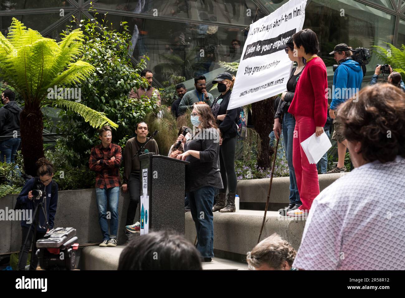 Seattle, USA. 31 May, 2023. Amazon corporate employees walk out of ...