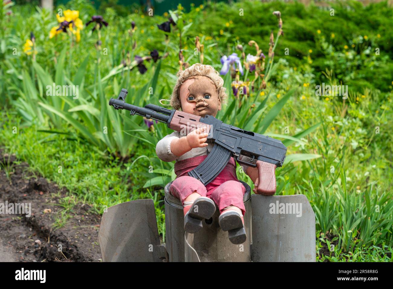 Ukraine. 31st May, 2023. View of a doll with toy rifle on top of the remnants of Russian rocket set by Ukrainian Army Forces on the side of the road in undisclosed location near town of Bahmut Donetsk region. (Photo by Lev Radin/Pacific Press) Credit: Pacific Press Media Production Corp./Alamy Live News Stock Photo