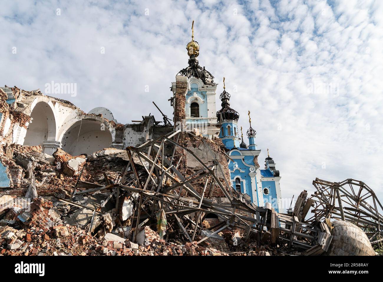 View of destroyed Church of the Holy Mother in village of Bohorodychne in Donetsk region by Russian forces during occupation from August 2022 until September 2022. Russian forces attacked the village in May 2022 and finally occupied the village in August for 2 months, it was liberated in September 2022. From the hills surrounding the village Russian forces shelled and destroyed homes, school and the famous Church of the Holy Mother of God ‘Joy of All Who Sorrow'. The church became a convent of the Sviatohirsk Lavra in 2008. The church belongs to the Ukrainian Orthodox Church (Moscow Patriarcha Stock Photo