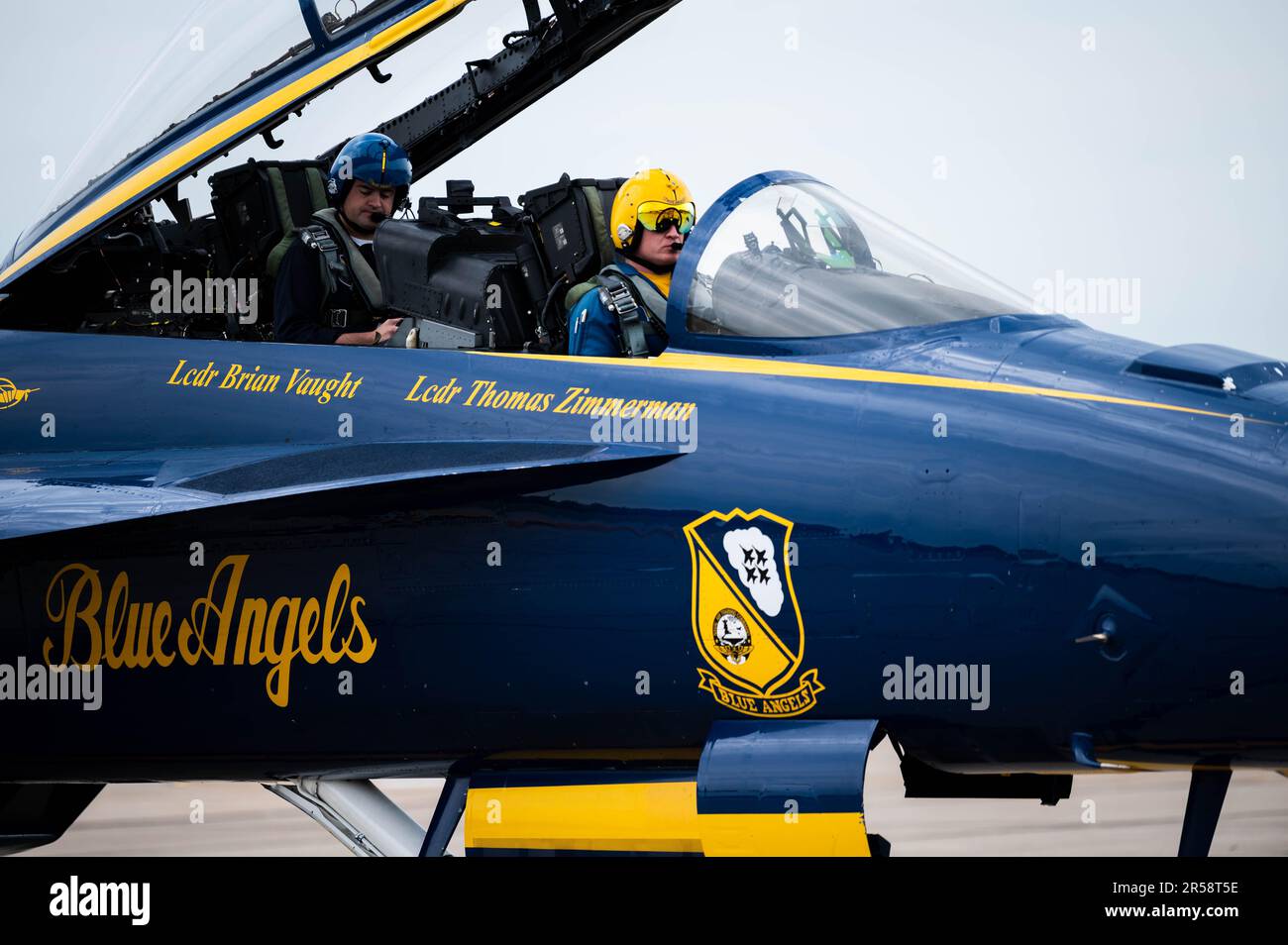 Scott Blue U.S. Navy Lt. Cmdr. Thomas Zimmerman prepares to close the canopy of a ...