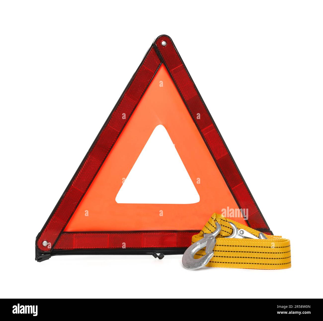 Emergency warning triangle and towing strap on white background. Car