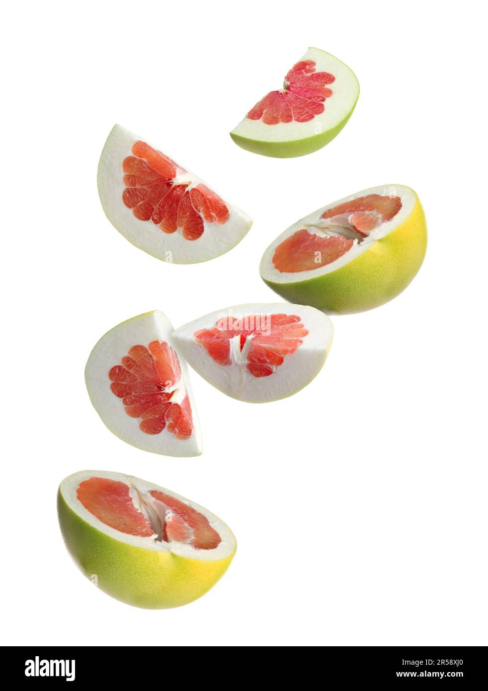 Fresh pomelo fruits falling on white background Stock Photo