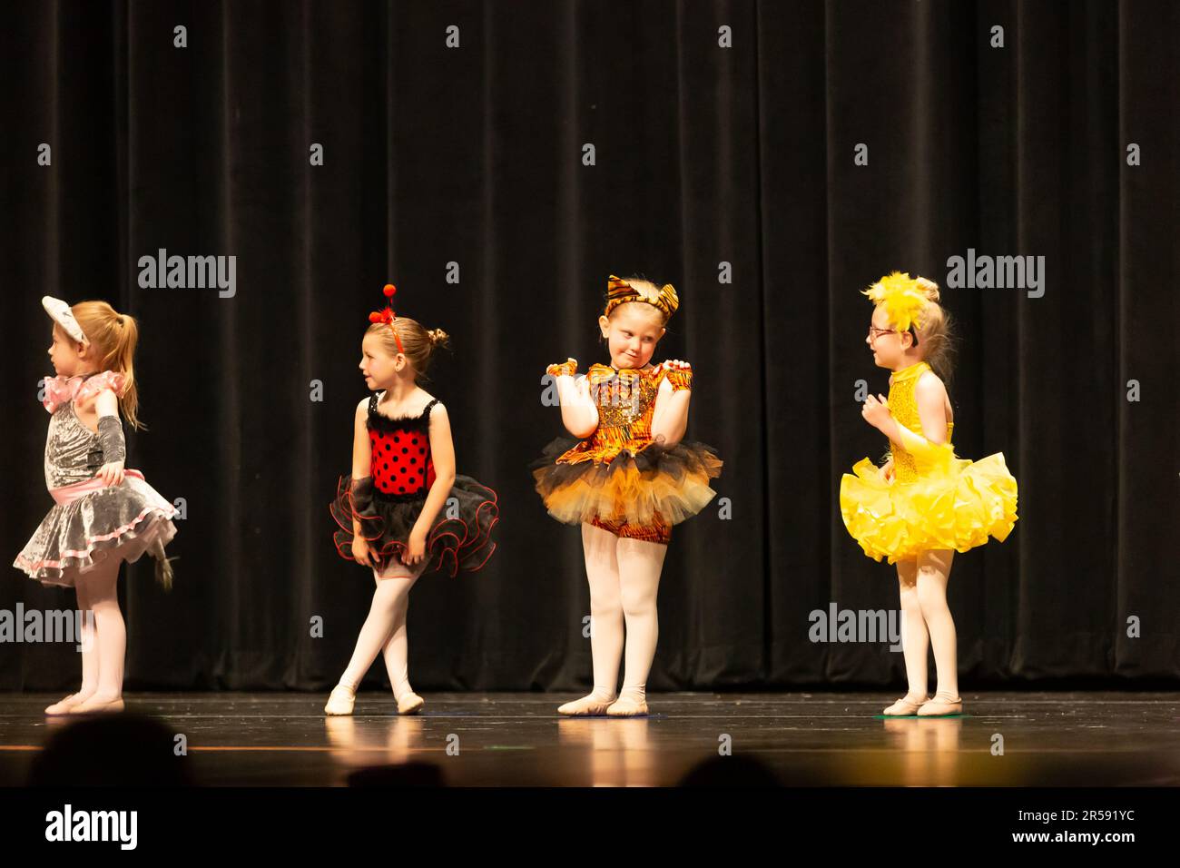 Little girls performing a dance routine Stock Photo - Alamy