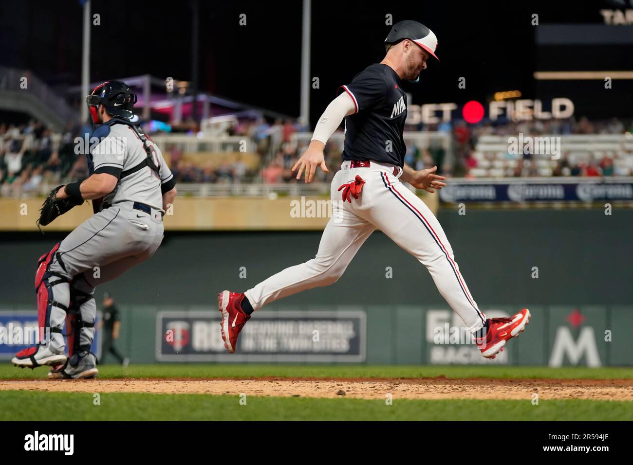 Minnesota Twins pinchrunner Ryan Jeffers scores the winning run