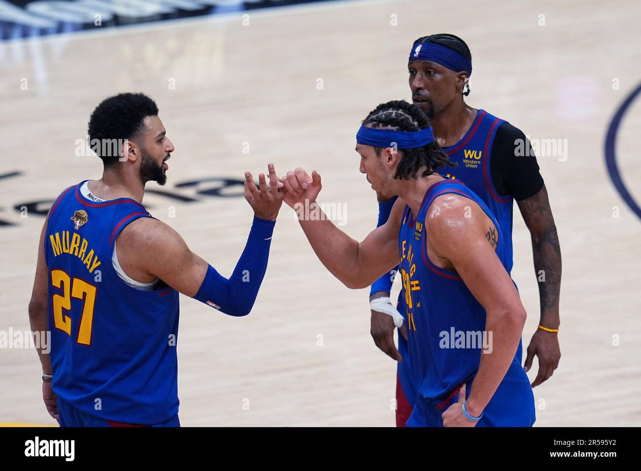 Denver Nuggets guard Jamal Murray, left, and forward Aaron Gordon ...
