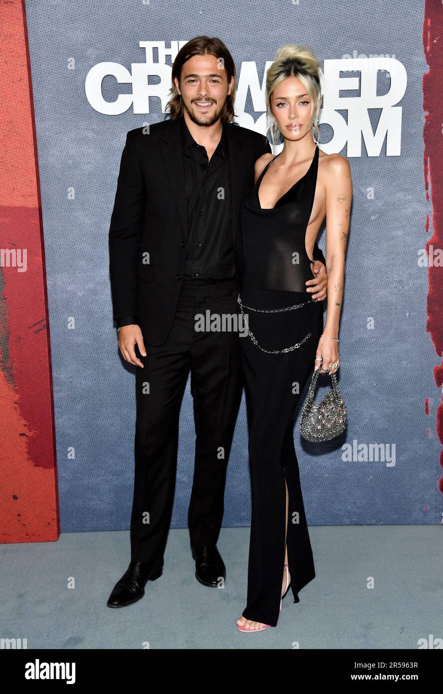 Henry Eikenberry, left, and girlfriend Delilah Hamlin attend the Apple