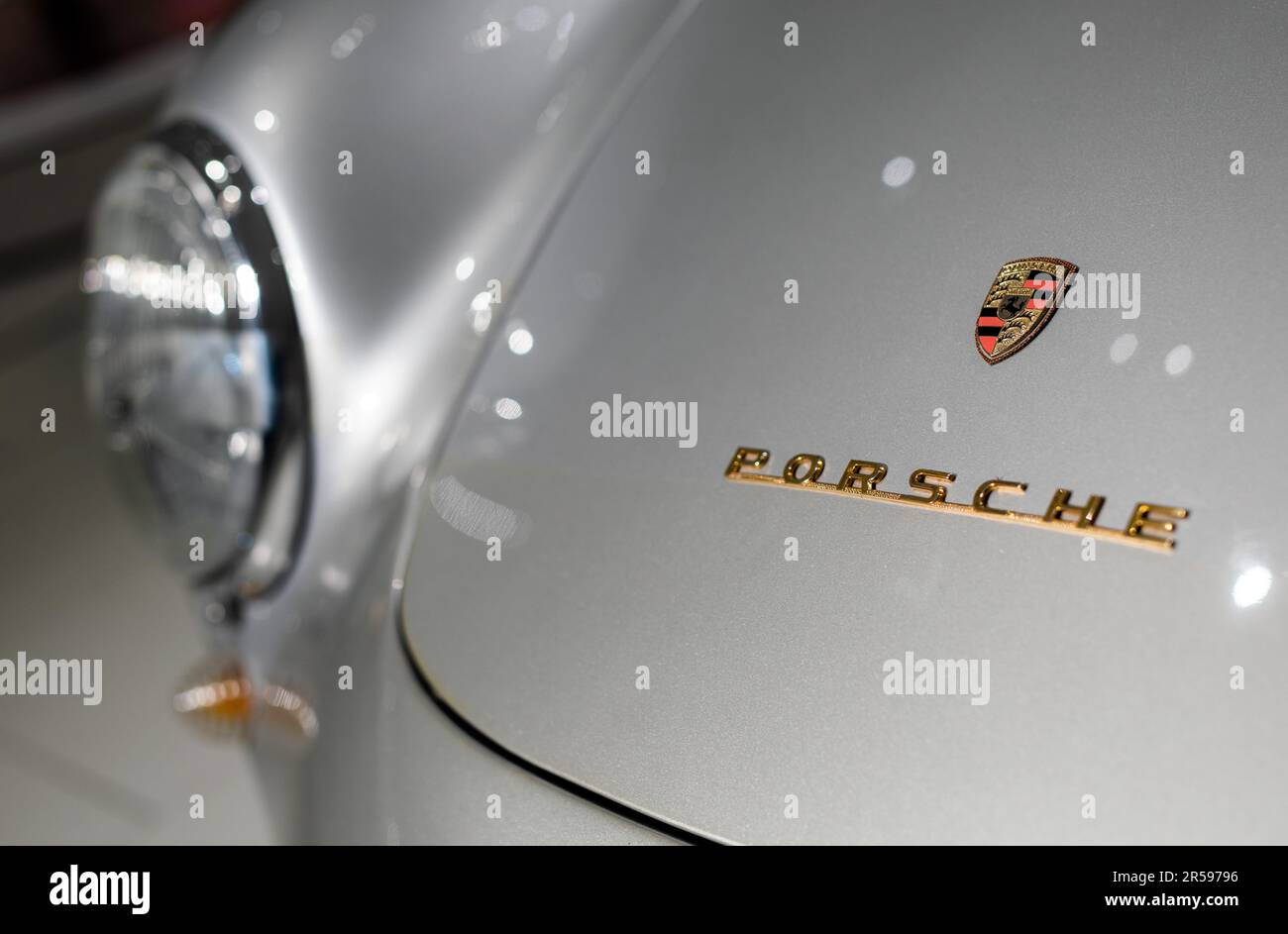 Stuttgart, Germany. 01st June, 2023. The logo and lettering of the sports car manufacturer Porsche can be seen on the hood of a Porsche 550 A Spyder in the Porsche Museum. The sports car manufacturer from Zuffenhausen celebrates its 75th anniversary this year. Credit: Christoph Schmidt/dpa/Alamy Live News Stock Photo