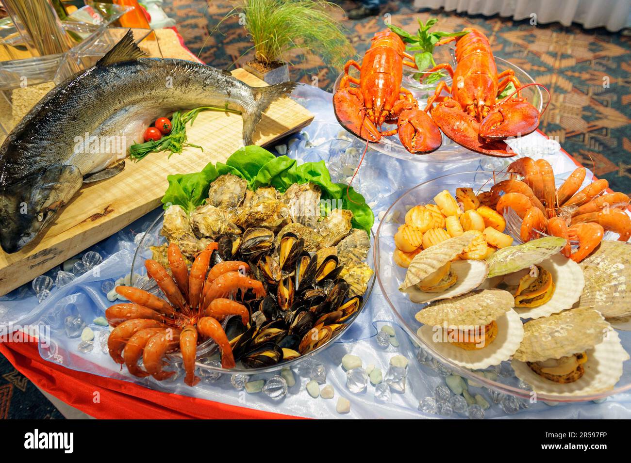 Various fresh seafood dishes or platters Stock Photo