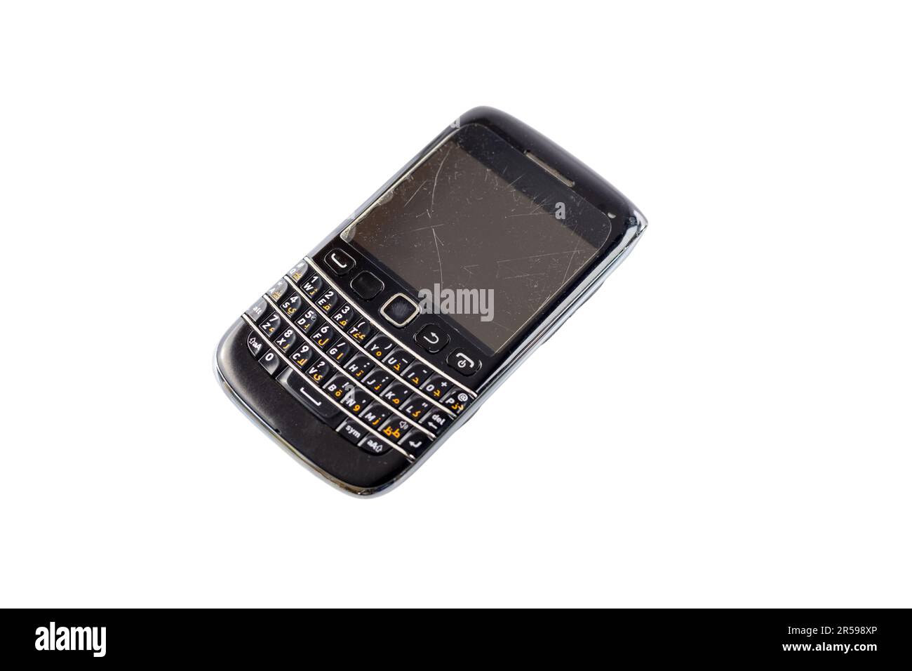 Used Blackberry smartphone with QWERTY keyboard isolated on a white background with copy space Stock Photo