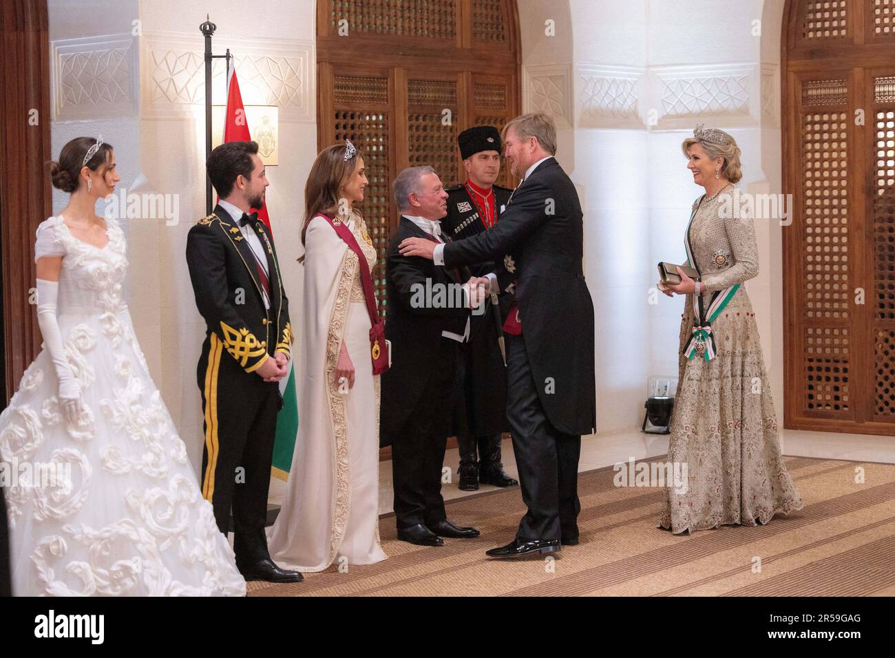 Amman, Jordan. 01st June, 2023. King Willem-Alexander of the Netherlands and Queen Maxima salute King Abdullah II of Jordan and Queen Rania, as they attend Jordan's Crown Prince Al Hussein bin Abdullah II's Royal Wedding Banquet at Al Husseinieh Palace in Amman, Jordan, on June 1st, 2023. Photo by Balkis Press/ABACAPRESS.COM Credit: Abaca Press/Alamy Live News Stock Photo