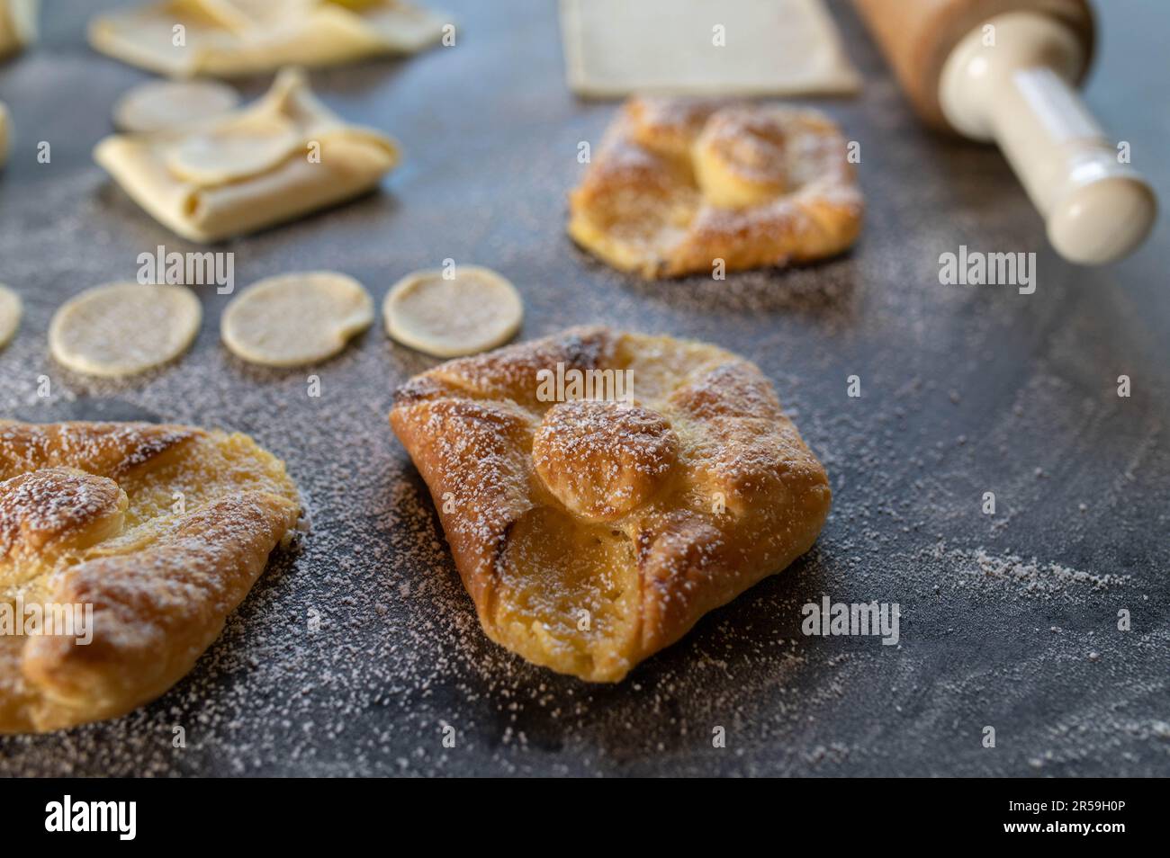 Baked and unbaked puff pastry. Baking preparation Stock Photo