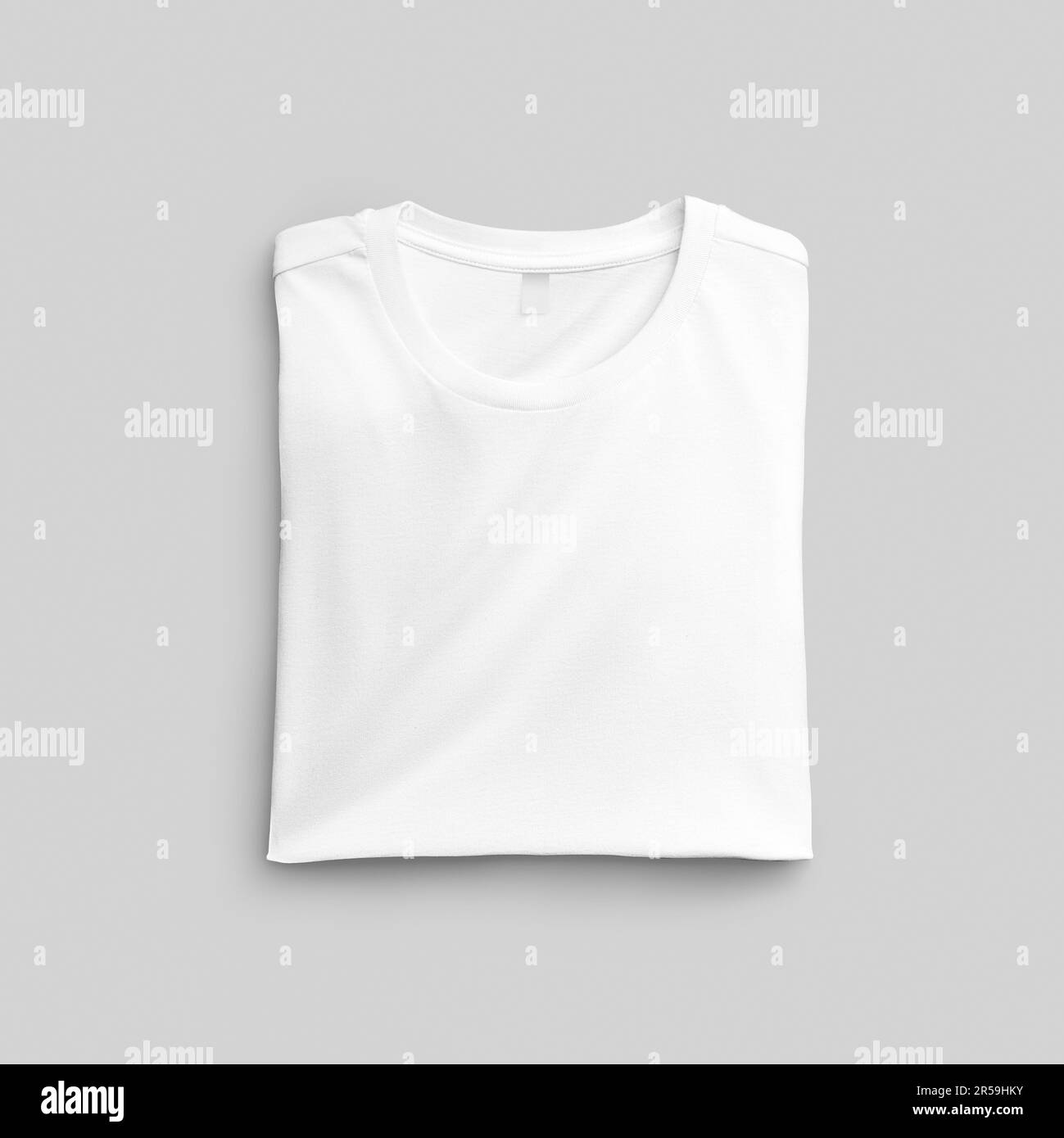 Folded white t-shirt mockup with label, shirt closeup, top view ...
