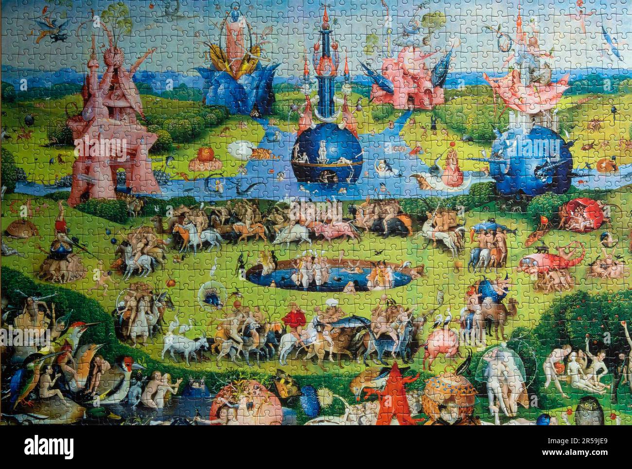 The Garden of Earthly Delights by Jeroen Bosch as a puzzle.  The Garden of Earthly Delights is the modern title given to a triptych oil painting on oa Stock Photo