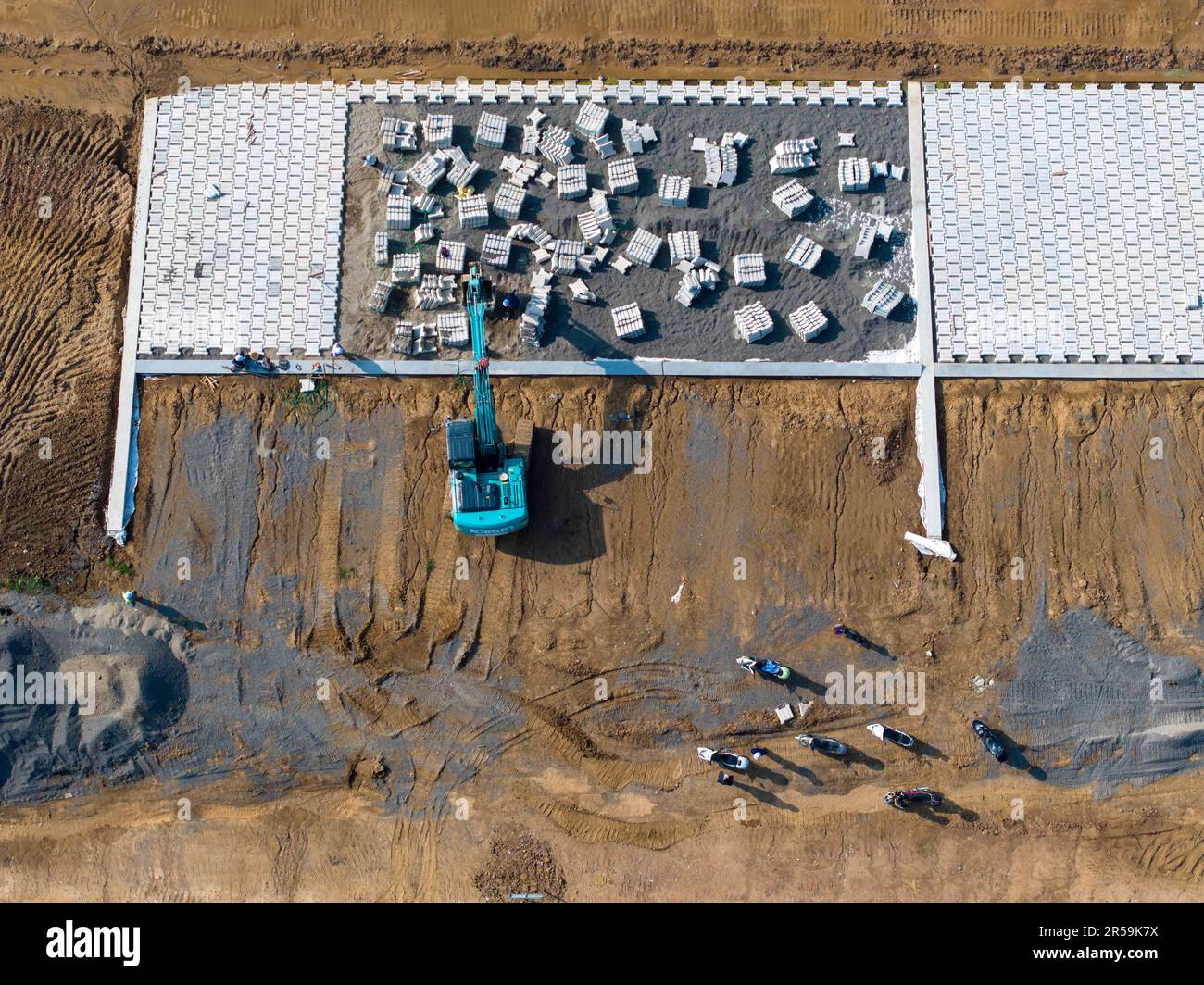 HUAI'AN, CHINA - JUNE 2, 2023 - Workers lay slope protection at the ...