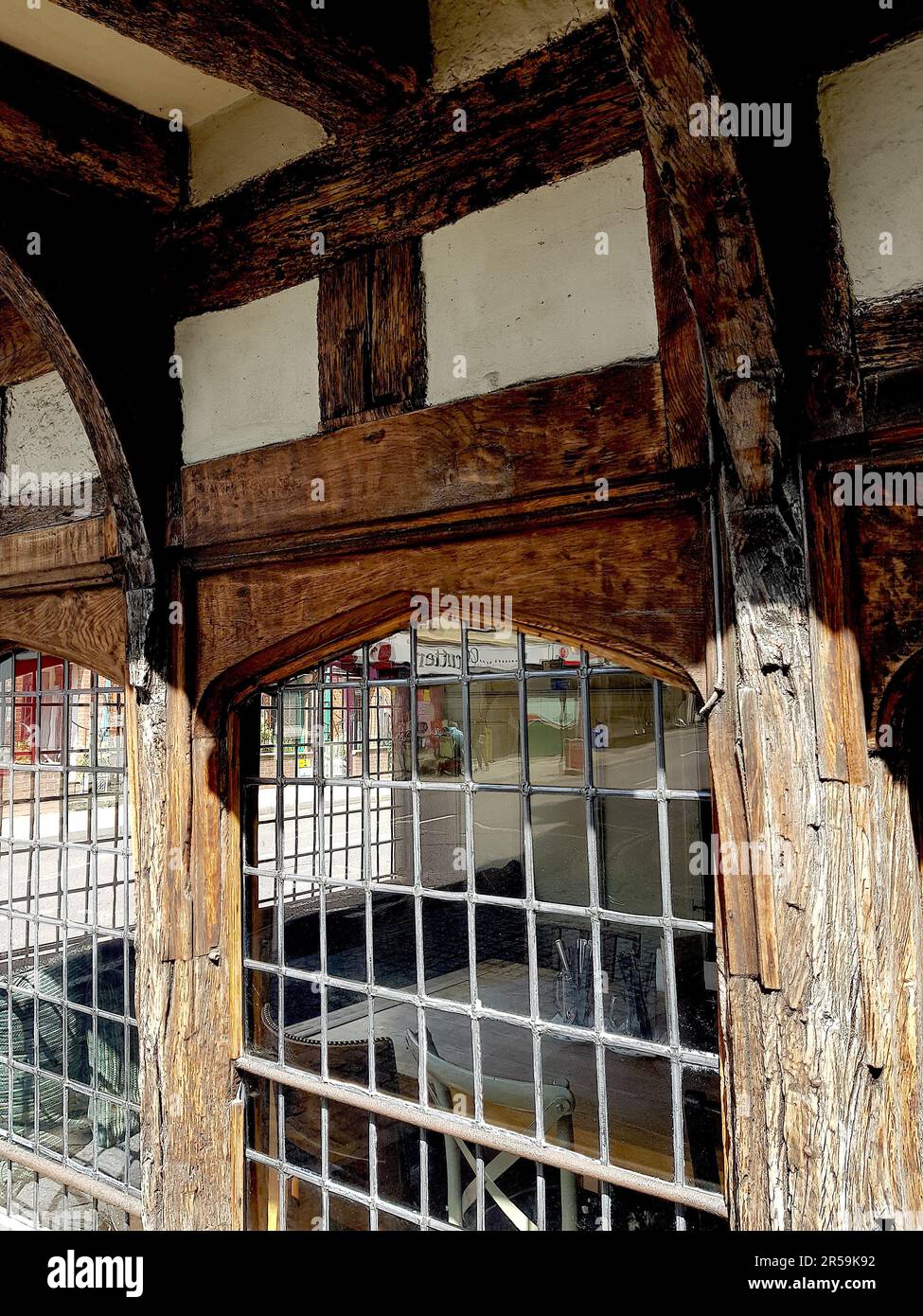 Detail from a traditional historic building showing a lattice window in Saffron Walden, UK. Stock Photo