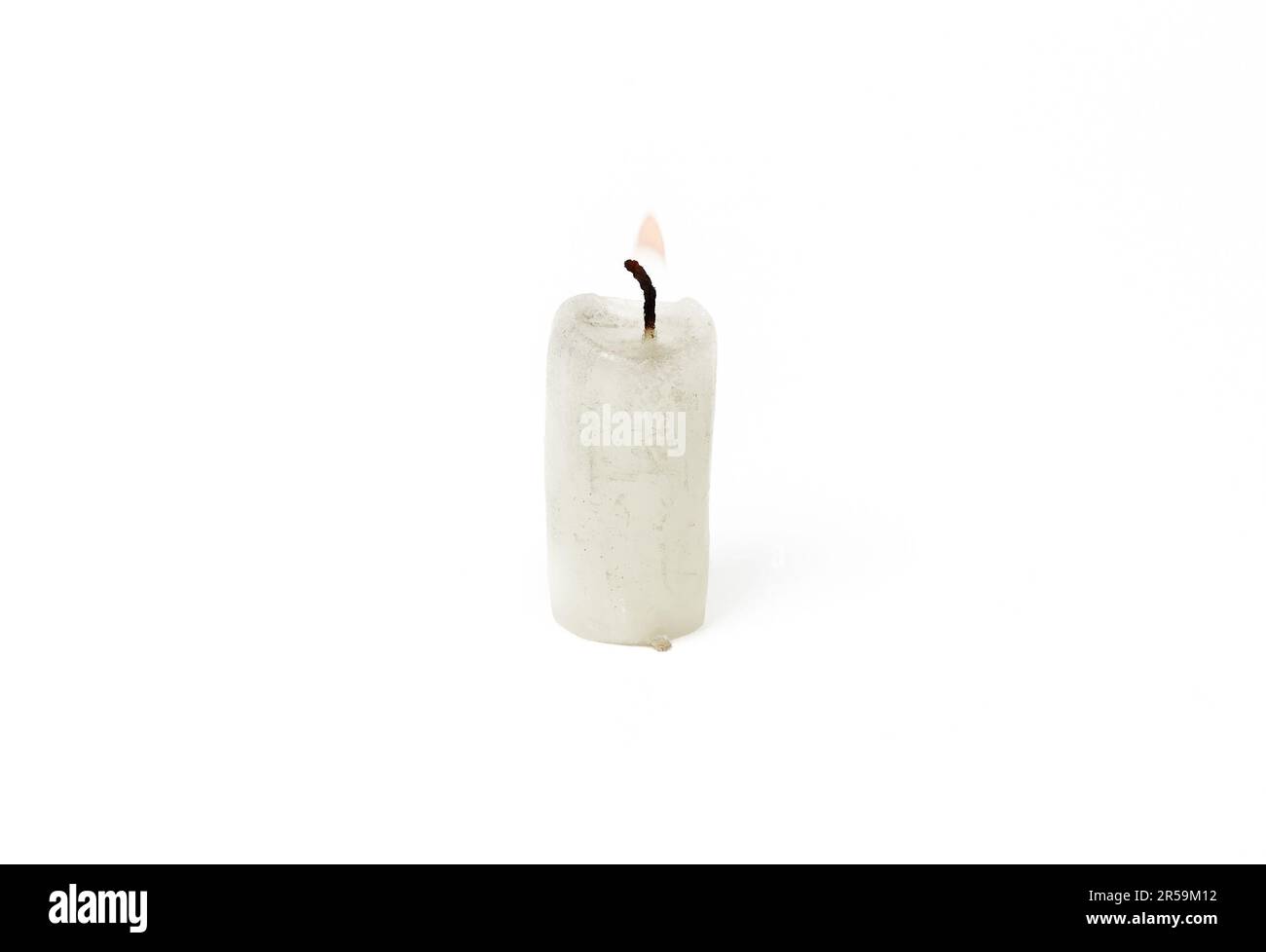 Candle isolated white background. Burning candle, closeup Stock Photo