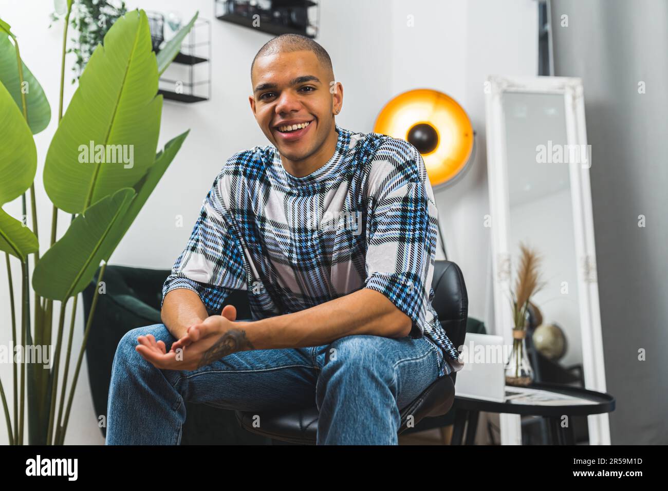 African boy sitting on floor hi-res stock photography and images - Alamy