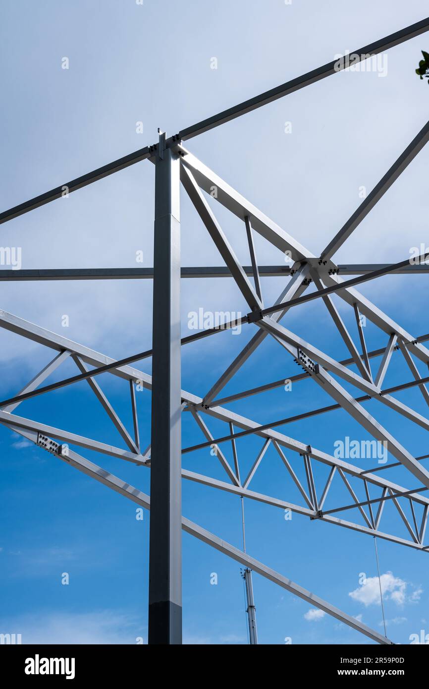 White painted steel beams and girders of a warehouse under construction Stock Photo Alamy