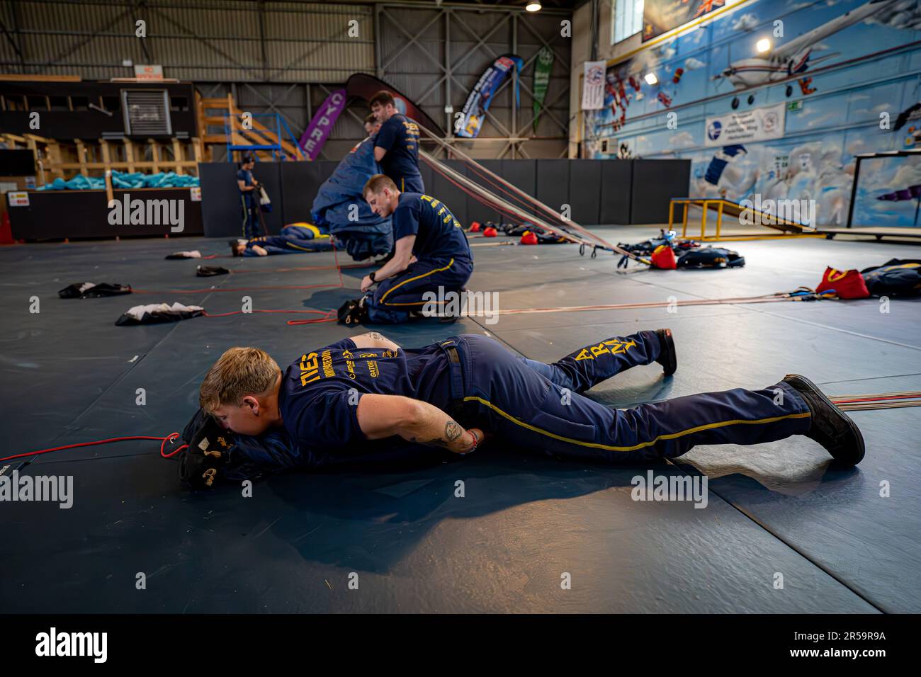 Stuart Botwright Private Matt Botwright lays on his parachute canopy to compress the air ...
