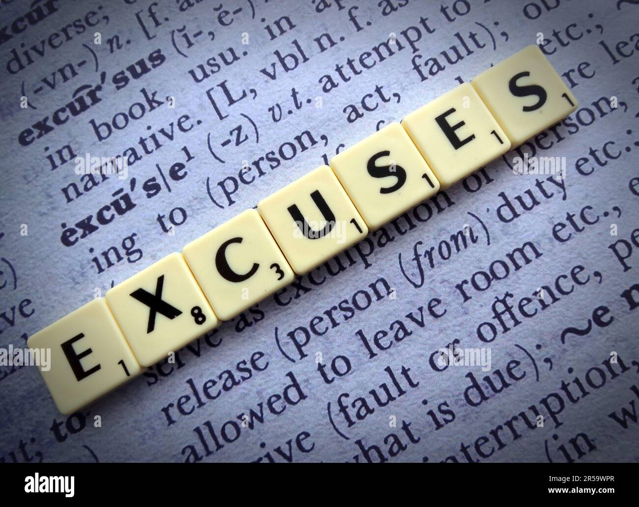 Lies, excuse and excuses, dictionary definition and Scrabble letters - political and sales Stock Photo