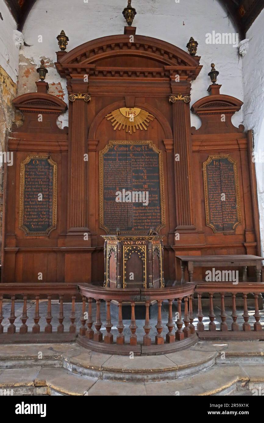 The historic wooden altar and reredos inside St Martin-cum-Gregory church near Micklegate in York, an example of traditional Anglican church interior Stock Photo