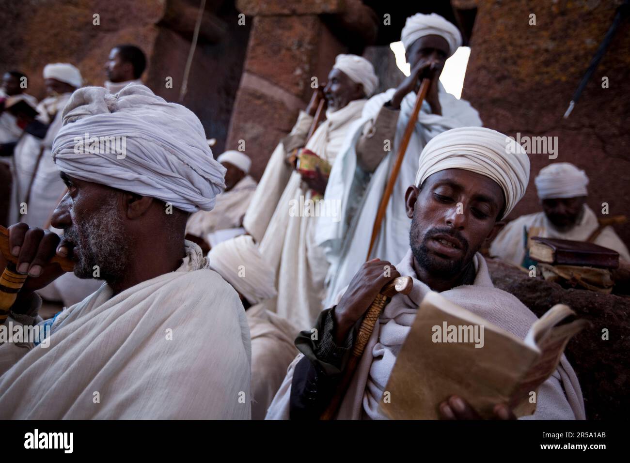 Ethiopian Orthodox Christian priests read the bible and pray together