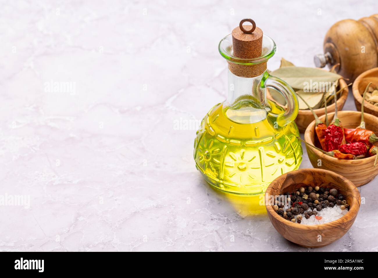 Various dried spices and olive oil Stock Photo
