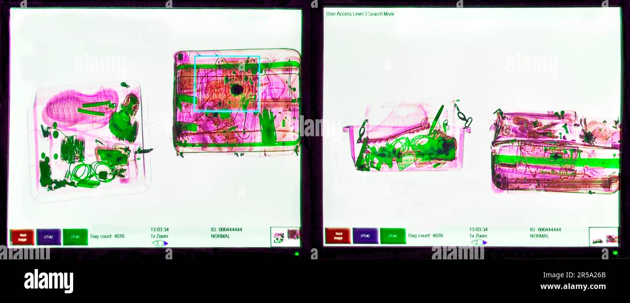 An airport security baggage xray monitor shows details of various
