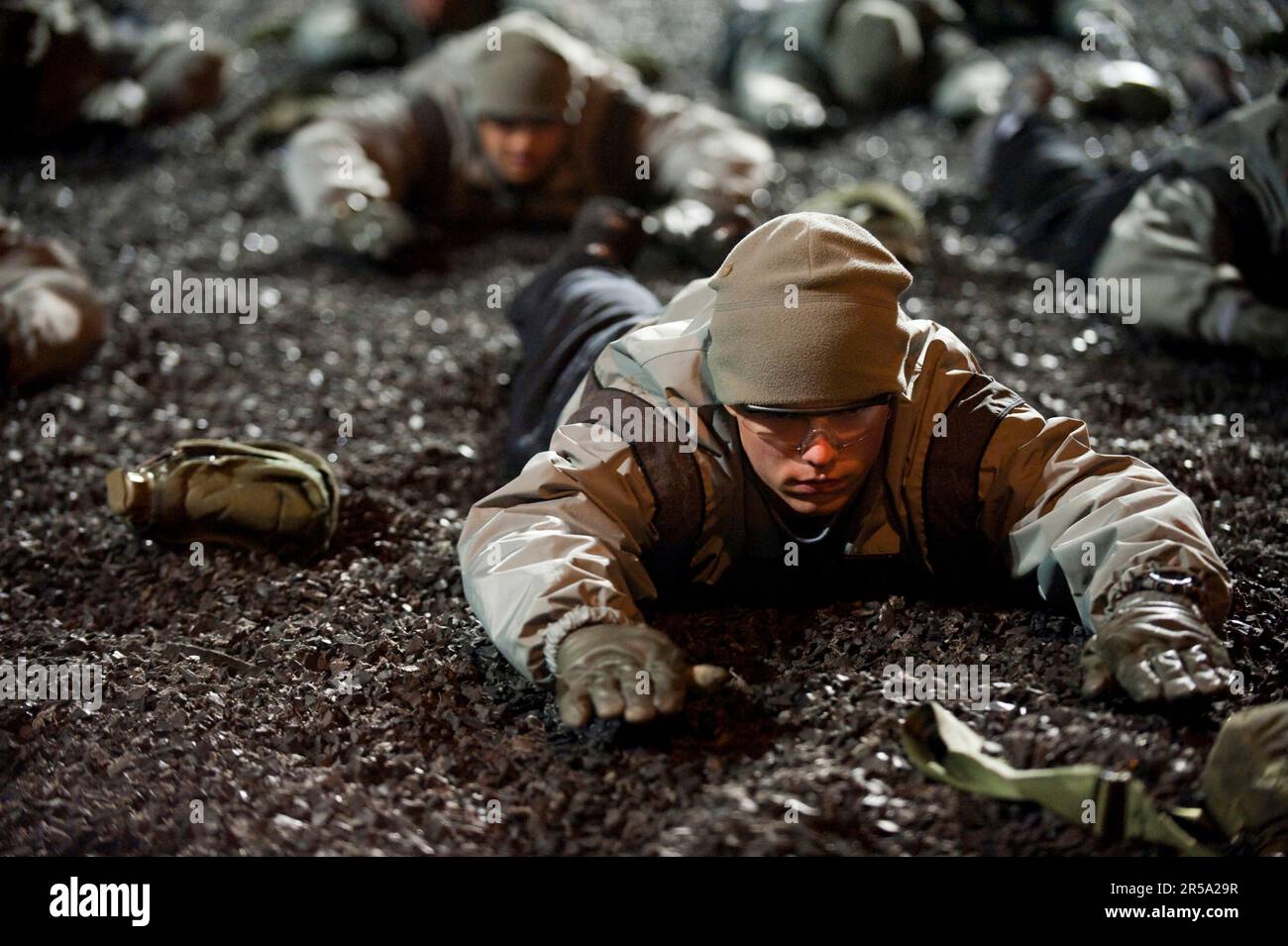 Soldiers in basic training do superman exercises during the physical training formation. Stock Photo