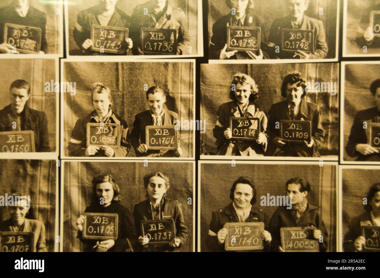 Photographs of Polish Jews are displayed inside the Warsaw Rising Museum, housed in a red brick power station, it traces the history of the Rising through three levels of interacti Stock Photo