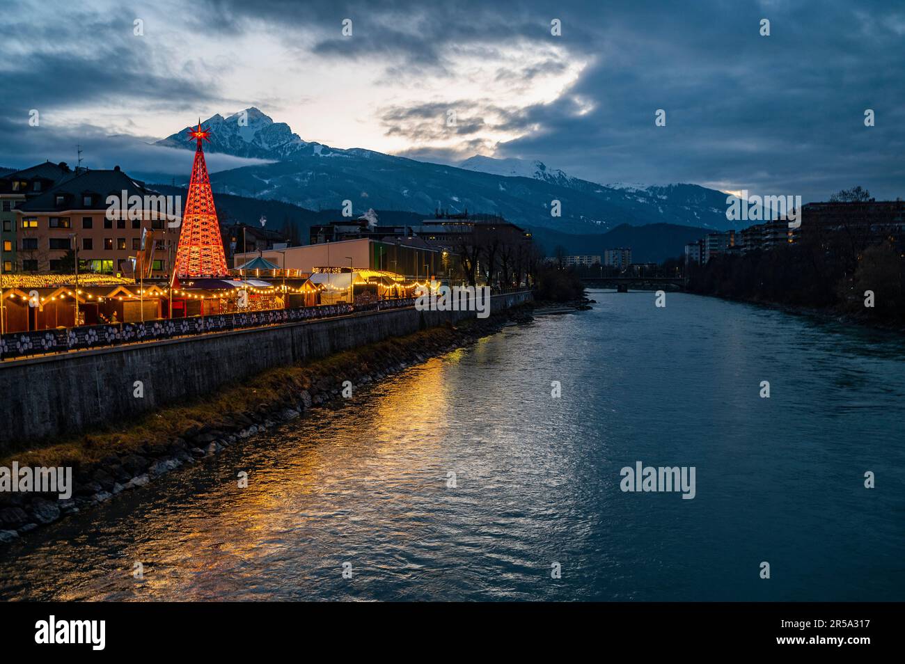 christmas market next to the river Inn at Innsbruck Stock Photo