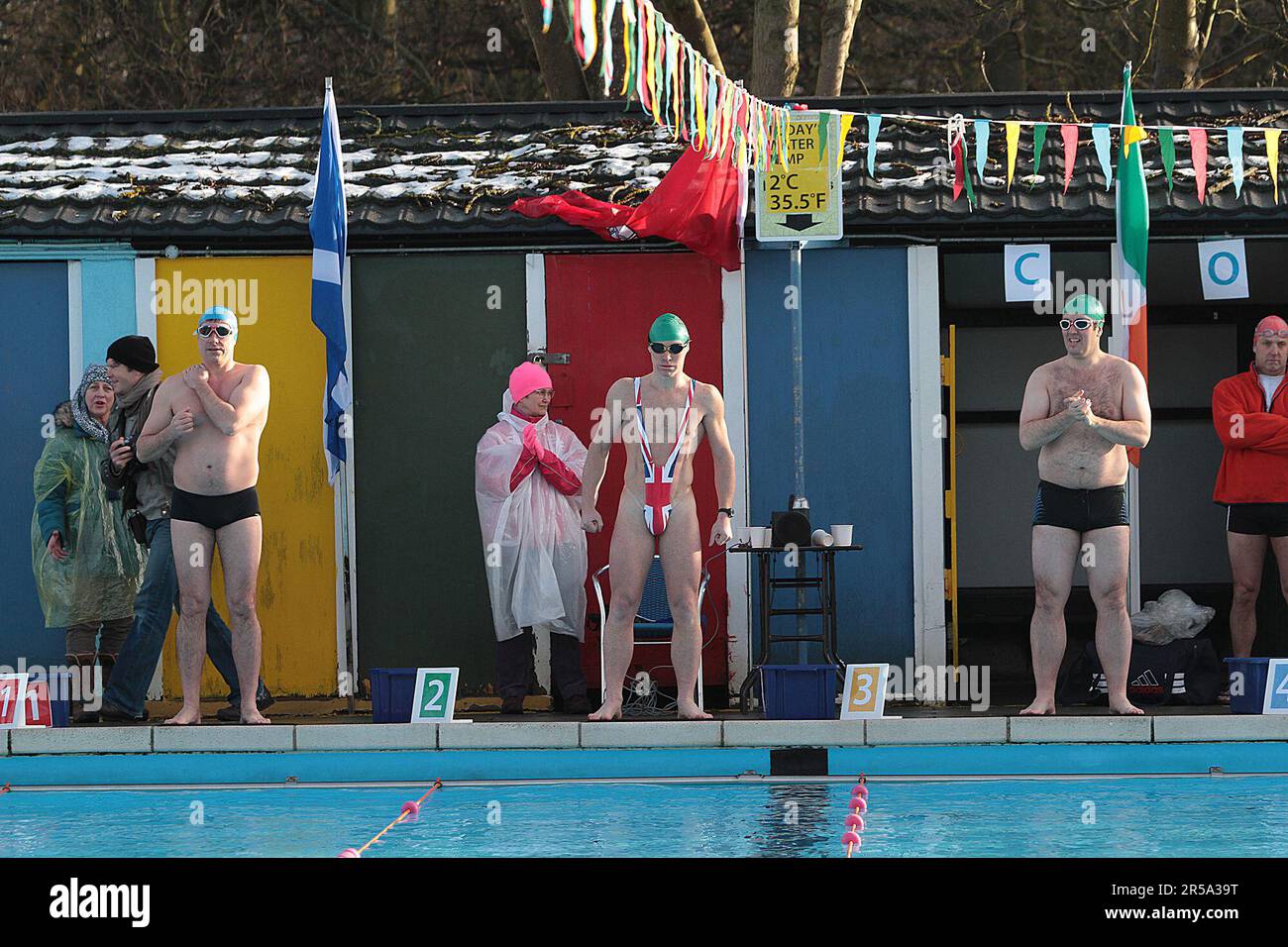 South London Swimming Club hosts the 5th Cold Water Swimming Championships at Tooting Bec Lido in South London, Britain's largest open-air, unheated fresh water pool. Over 600 swimmers braved the icy waters some wearing fancy dress. 25/01/2013 Stock Photo