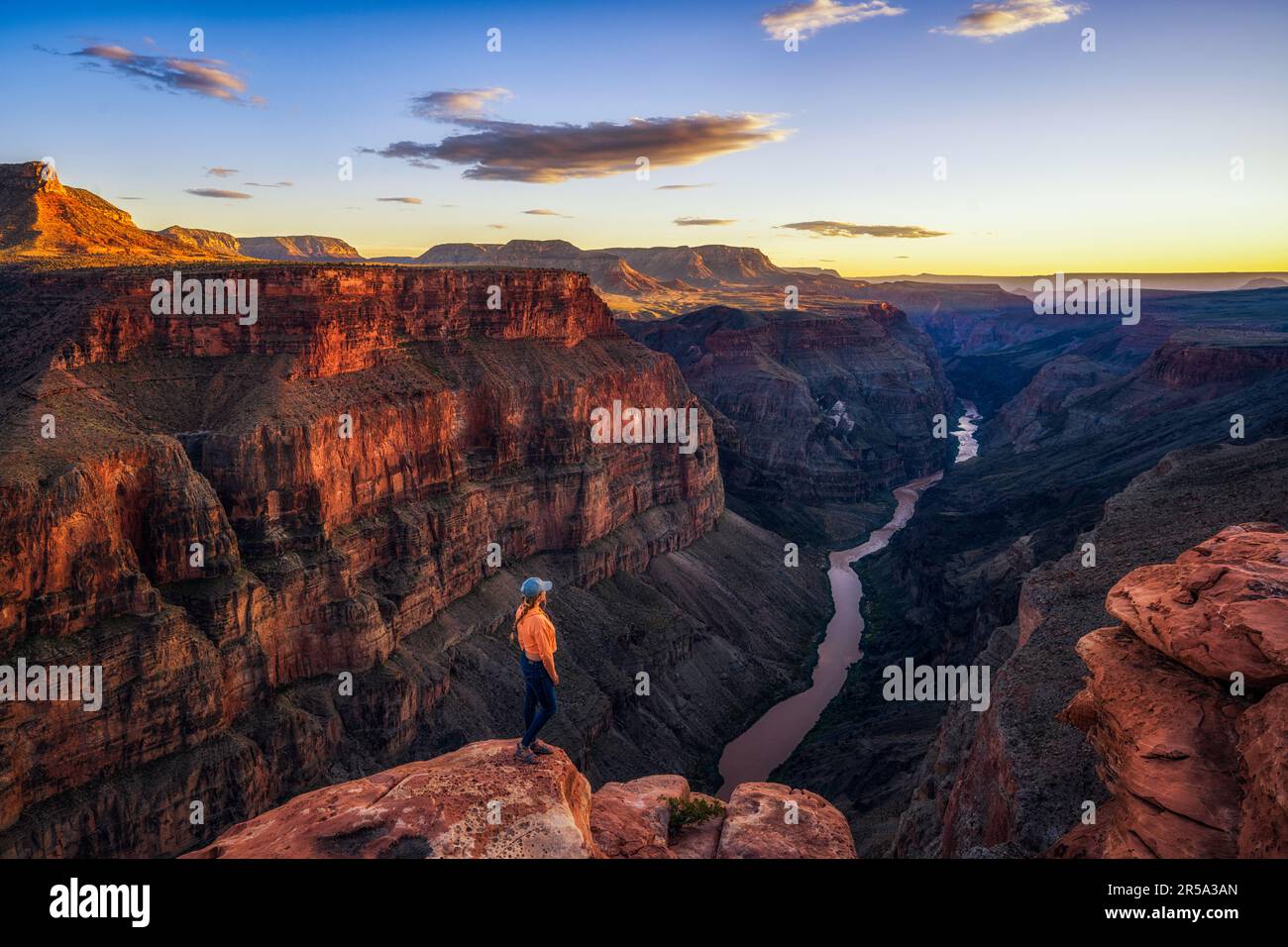 Woman Watching the Sunset Toroweap Overlook in the Grand Canyon Stock Photo