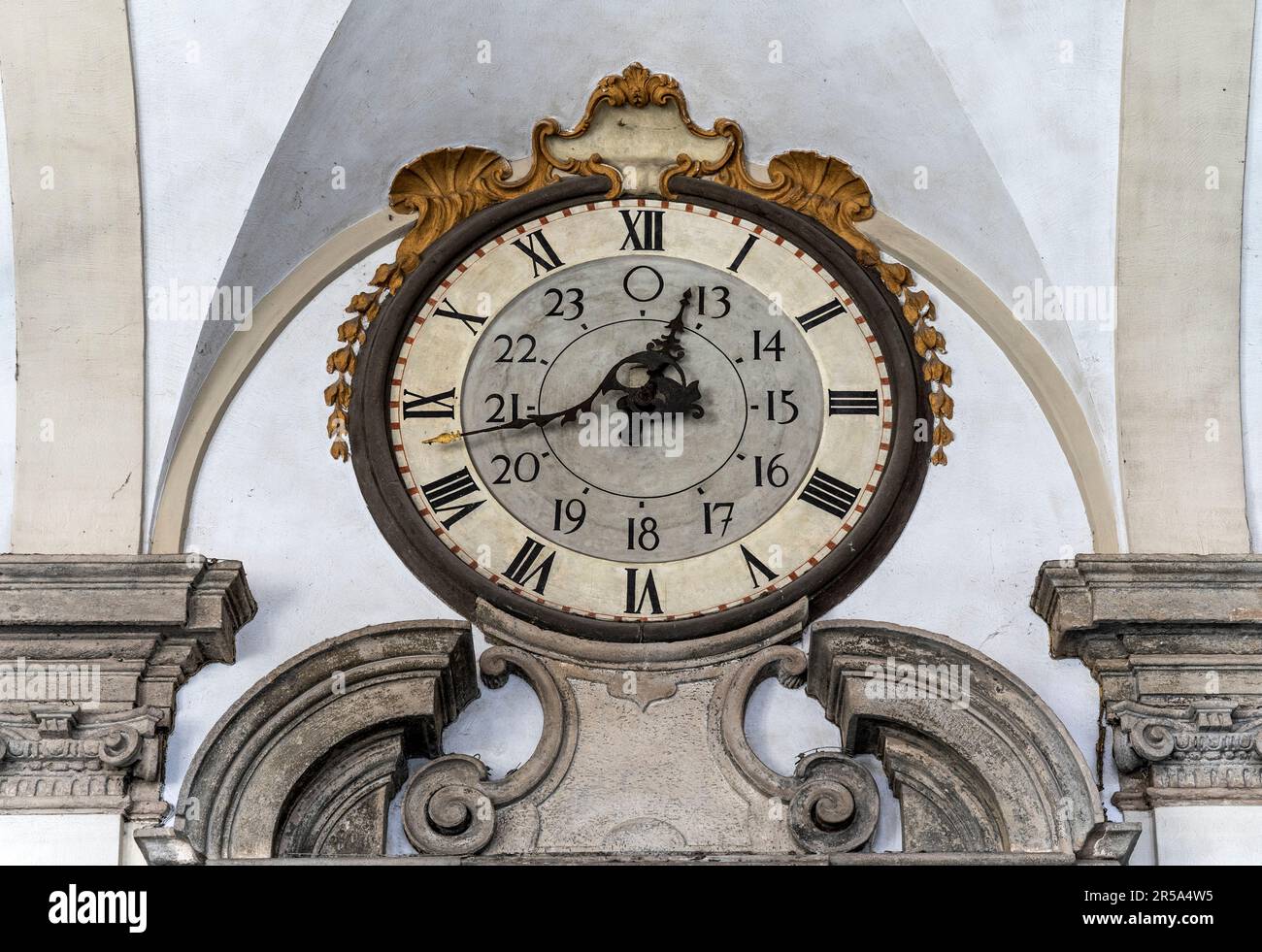 The old clock above the entrance of the 'Pinacoteca di Brera' (Brera Art Gallery) in Brera district, Milano city center, Italy Stock Photo
