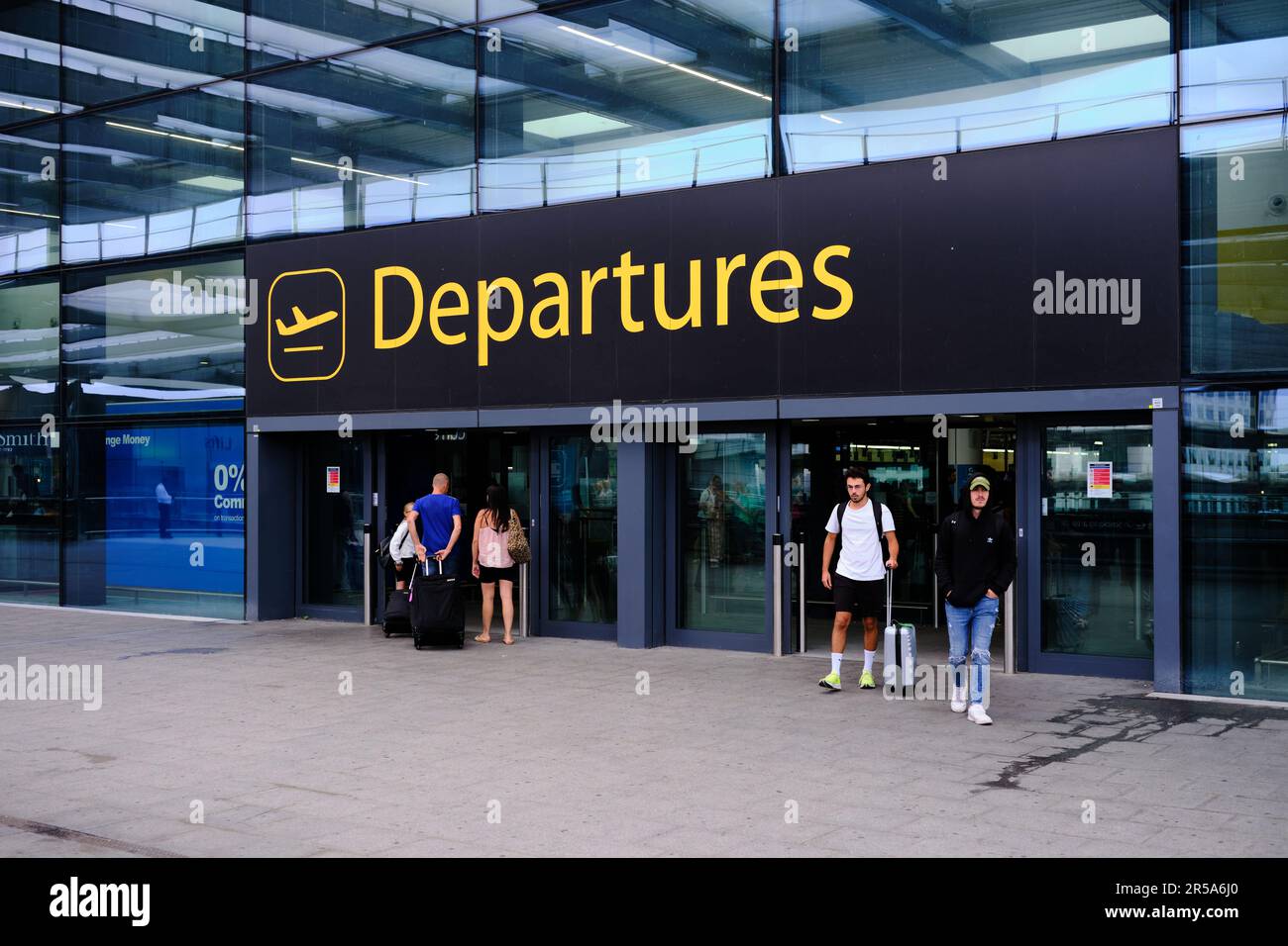 London, United Kingdom - August 22 2022: Entrance to departures at Gatwick Airport. Incidental people. Stock Photo