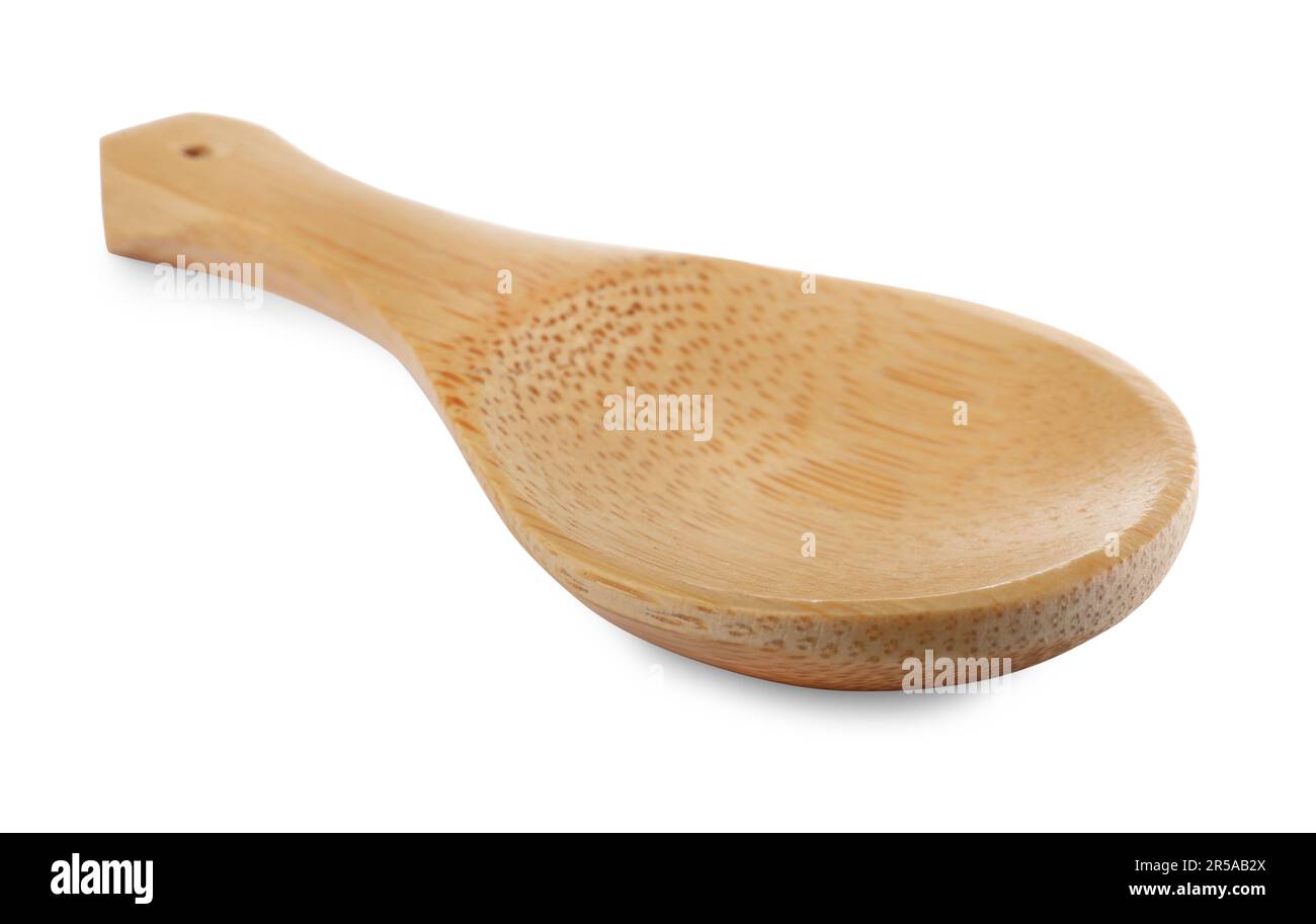 One new wooden spoon on white background Stock Photo - Alamy
