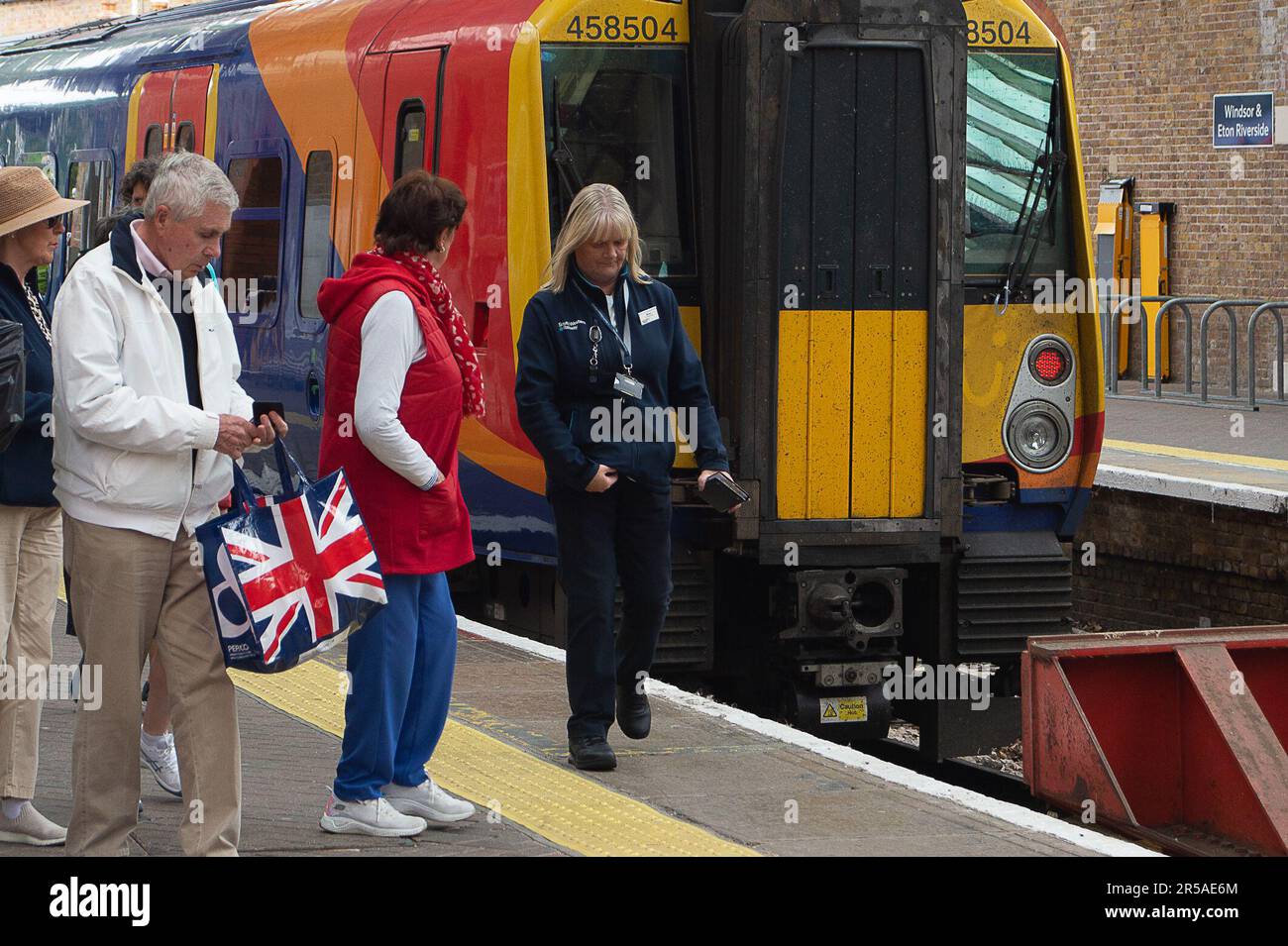 Windsor, Berkshire, UK. 2nd June, 2023. Passengers arriving in Windsor on a South Western Railway train. There are severe disruptions to trains today due to another RMT Rail Strike. Rail strikes are continuing in a dispute over pay and proposed closure of ticket offices. Credit: Maureen McLean/Alamy Live News Stock Photo