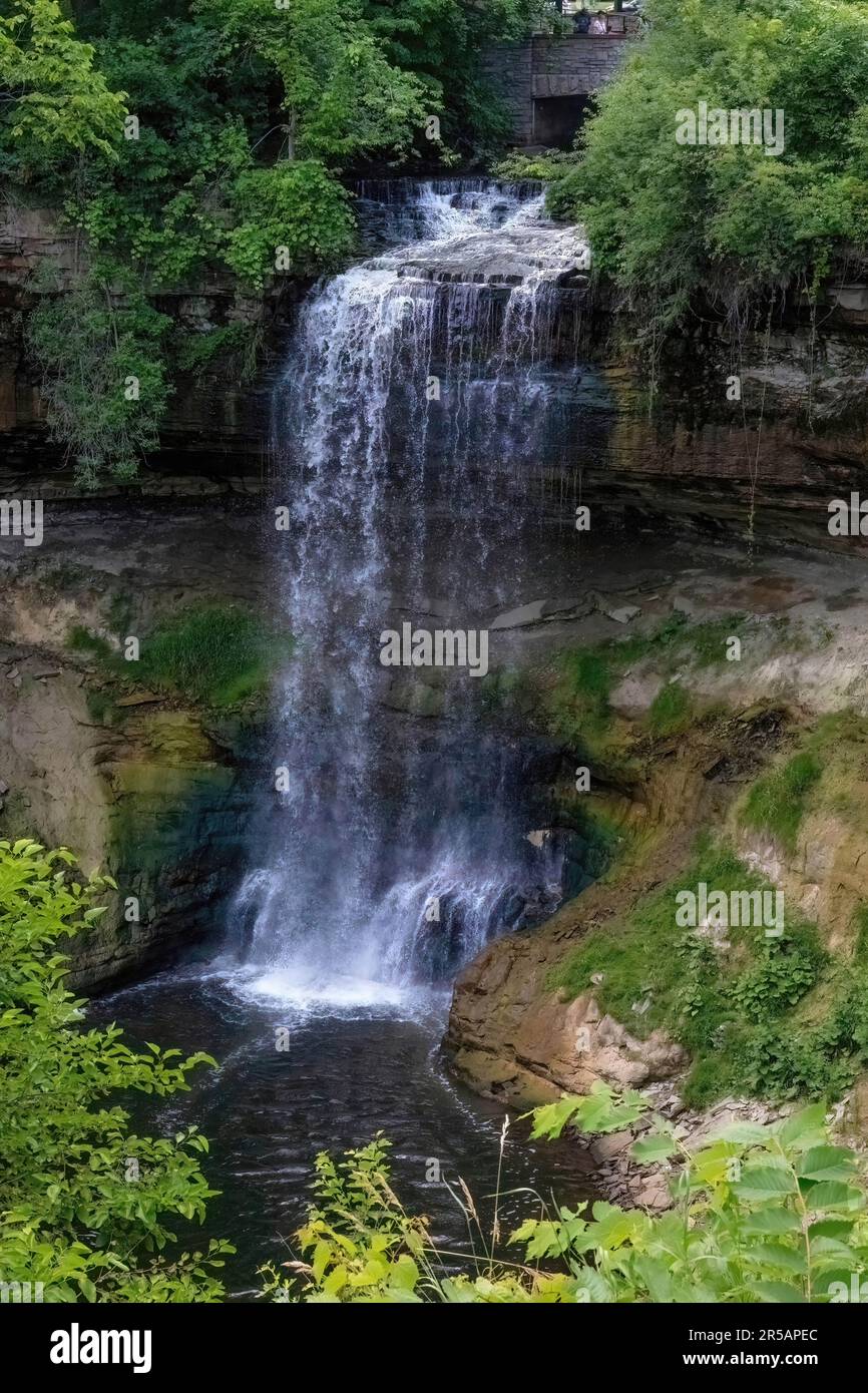 Minnehaha Falls waterfall at Minnehaha Park on a summer day in Minneapolis, Minnesota USA. Stock Photo