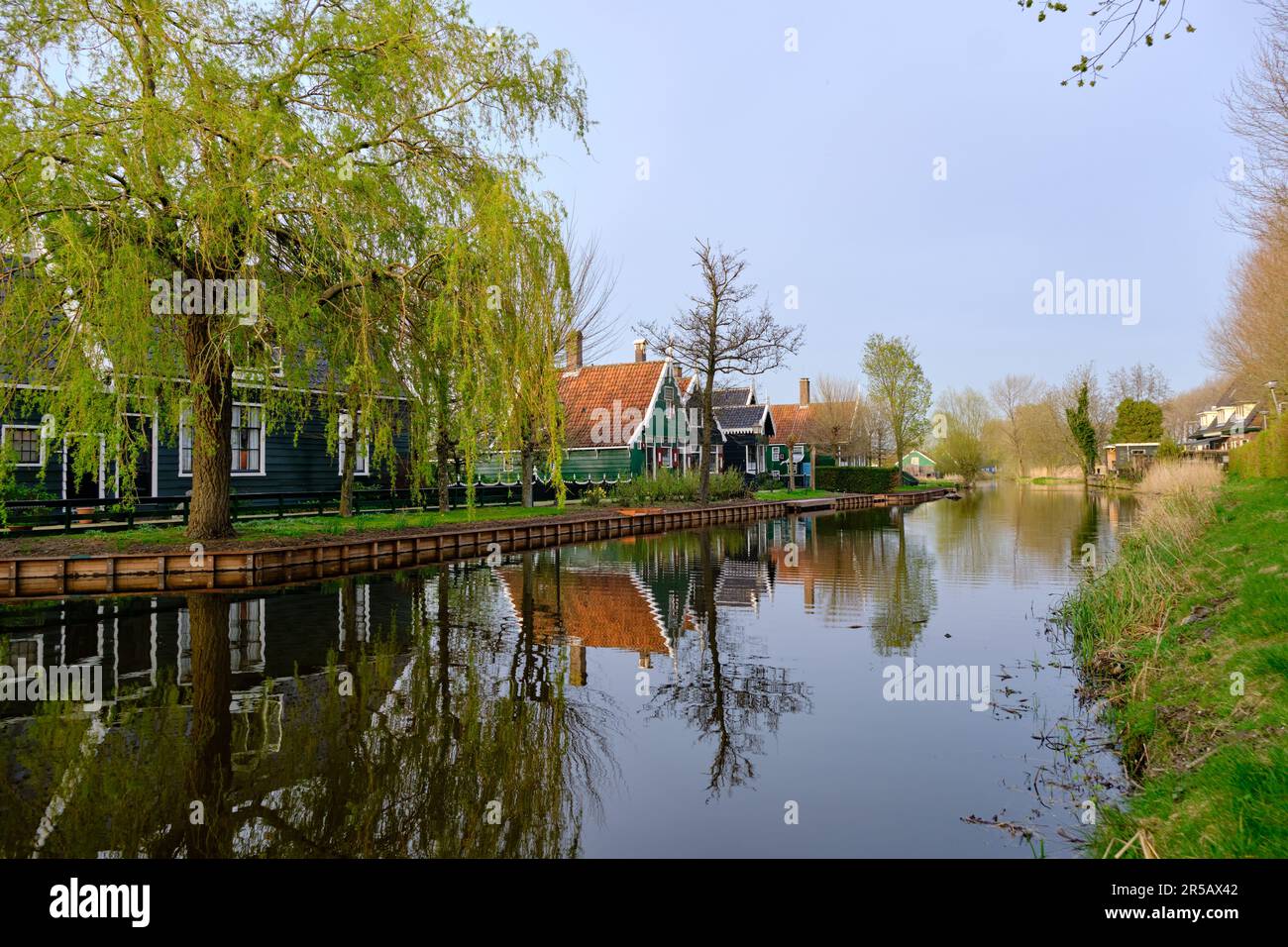 April 13 2022, Zaanse Schans, Netherlands, Authentic wooden Dutch houses on the banks of the