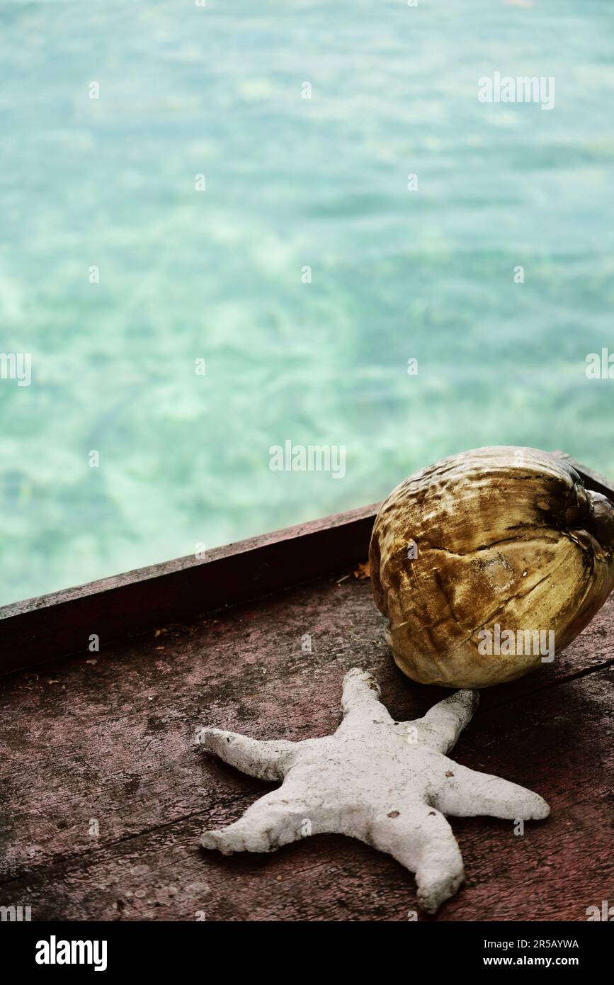 Close up of coconut and caribbean sea in Background. Bocas Del Toro. Panama. Panama Stock Photo