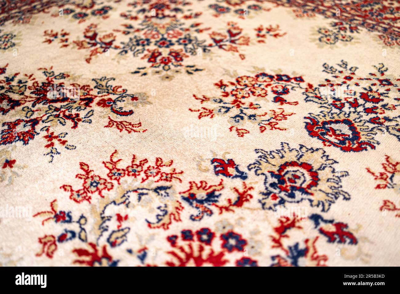 A patterned oriental style rug Stock Photo