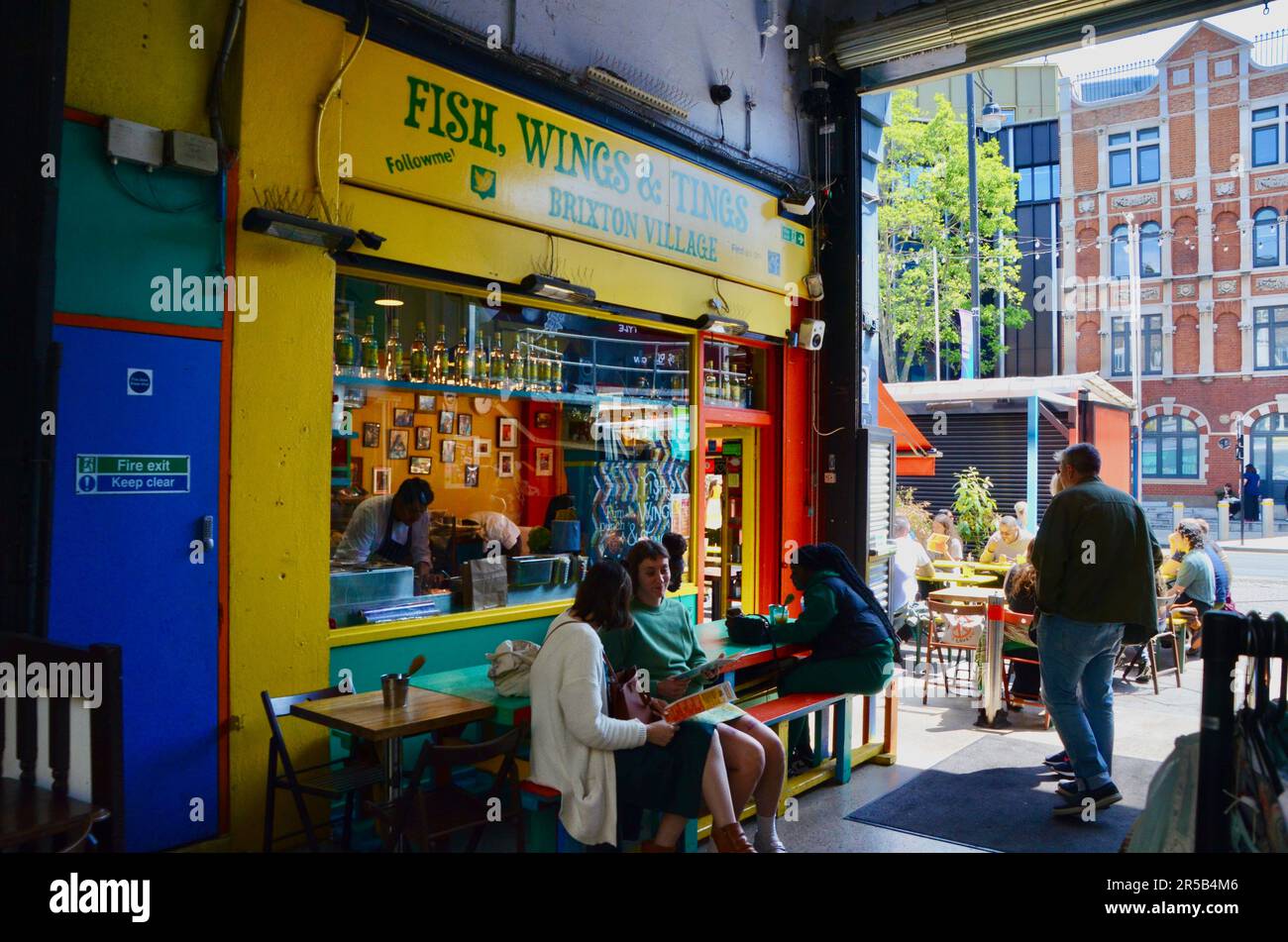 fish wings and tings; brixton SW9 market with stalls shops restaurants