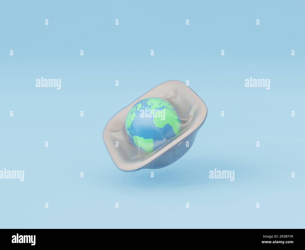 A white plastic container with a small globe resting on its lid Stock Photo Alamy