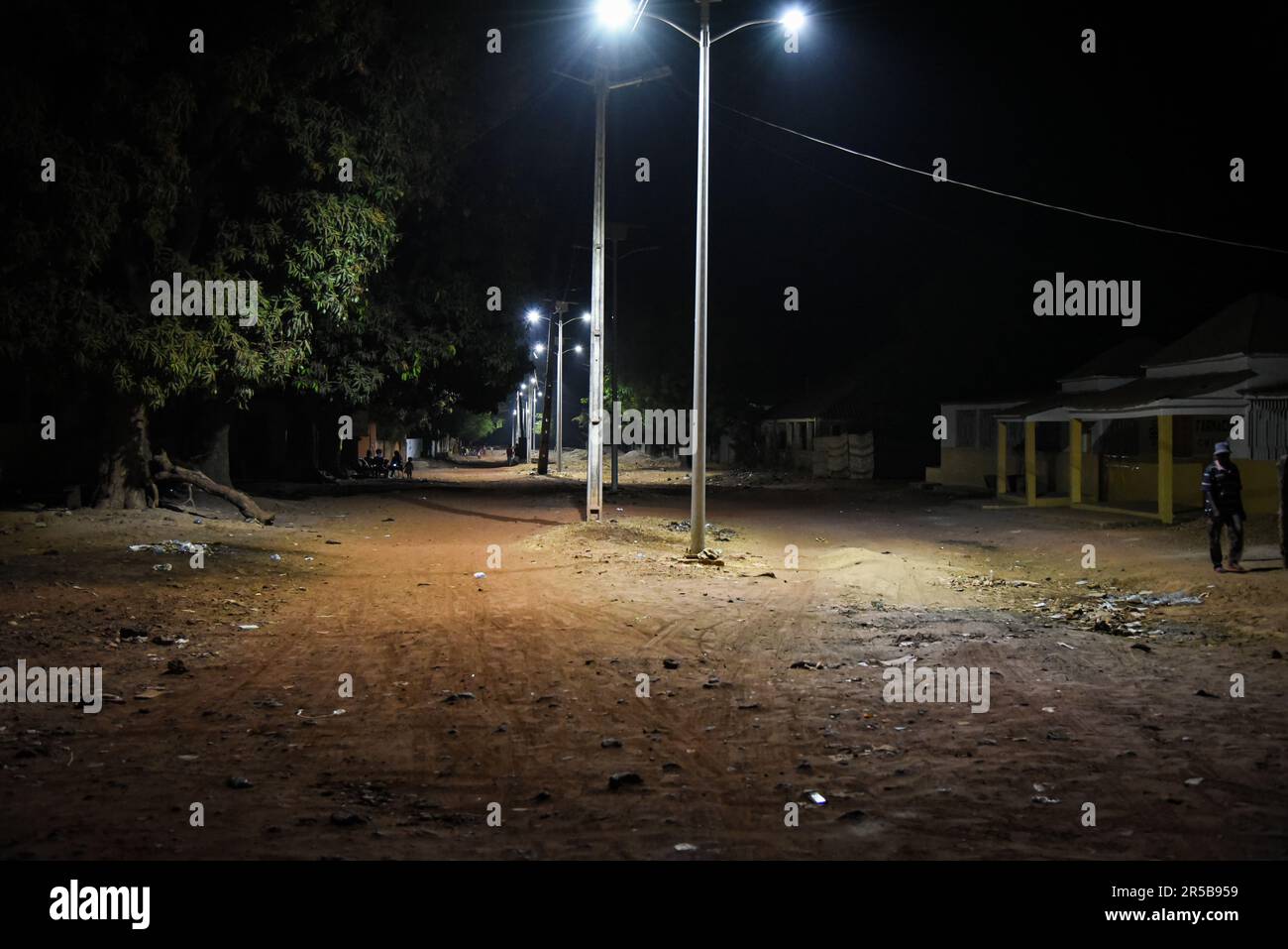 Nicolas Remene / Le Pictorium -  Solar energy and rural development in the Gabu region -  15/03/2017  -  Guinea-Bissau / Gabu / Gabu  -  Gabu, Example of night lighting in Gabu. Whether on the roads or in the narrow streets of the town centre, it's very dark. All the more so as there is no electricity on the grid until midnight.   *Solar Home System(SHS): System of domestic solar energy Stock Photo